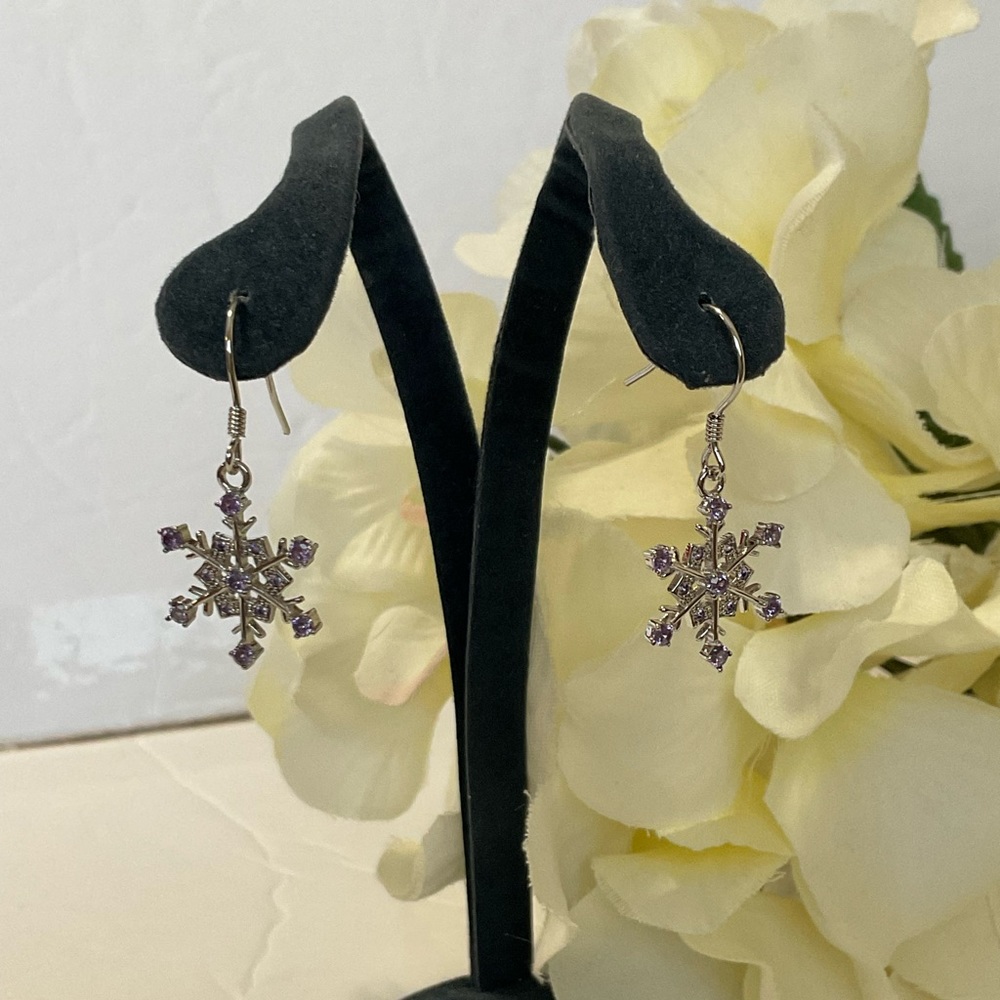 Silvertone Snowflake With Simulated Purple Diamon… - image 1